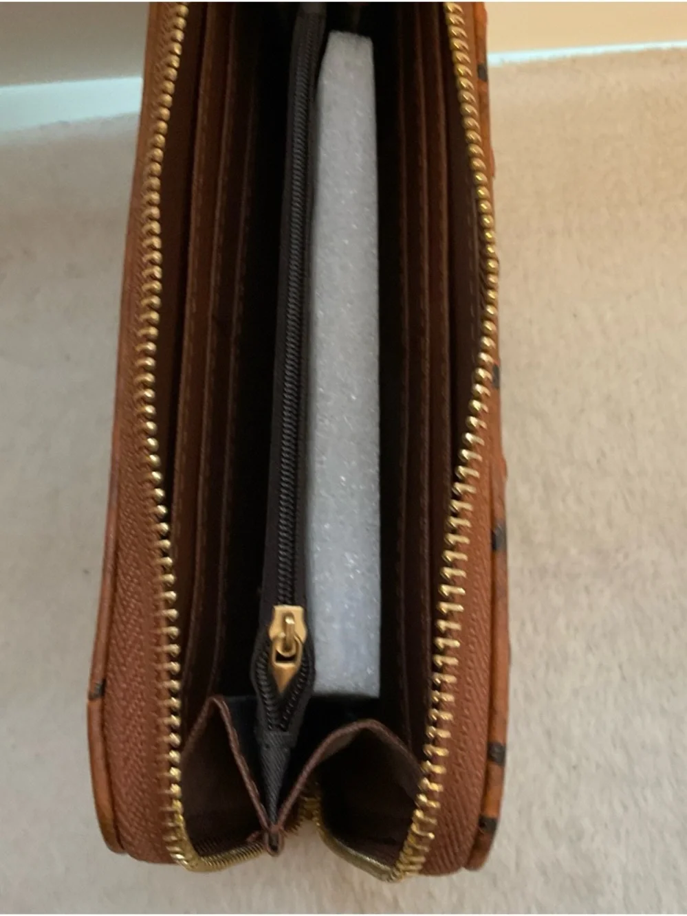 Brown Ostrich-Texture Zip Around Wristlet Clutch